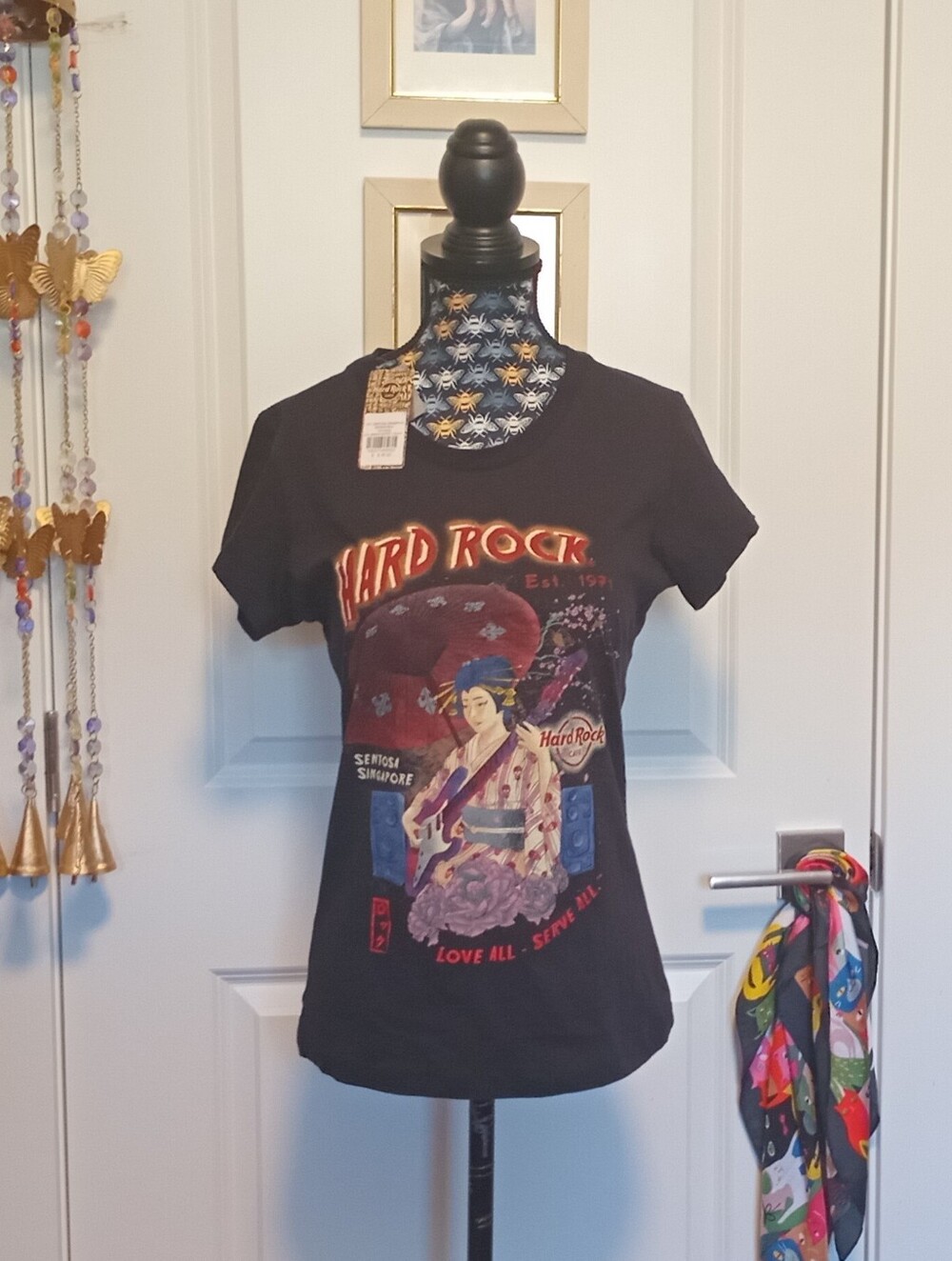 Hard Rock Cafe Singapore black tee with mesh flower design on the upper back